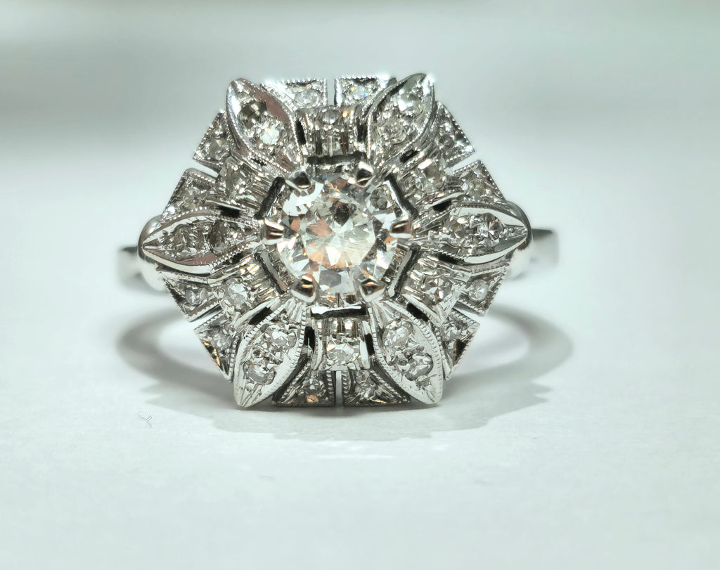 Art Deco 2.00 carat diamond gold ring with intricate design, featuring sparkling diamonds set in polished gold.