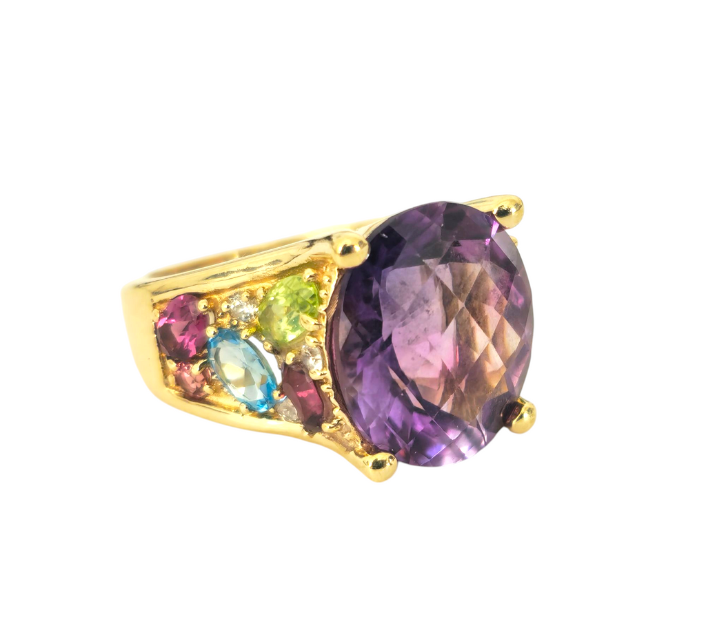 Multi gemstone ring in 14k yellow gold featuring colorful gemstones set in a stylish design by Prince The Jeweler.