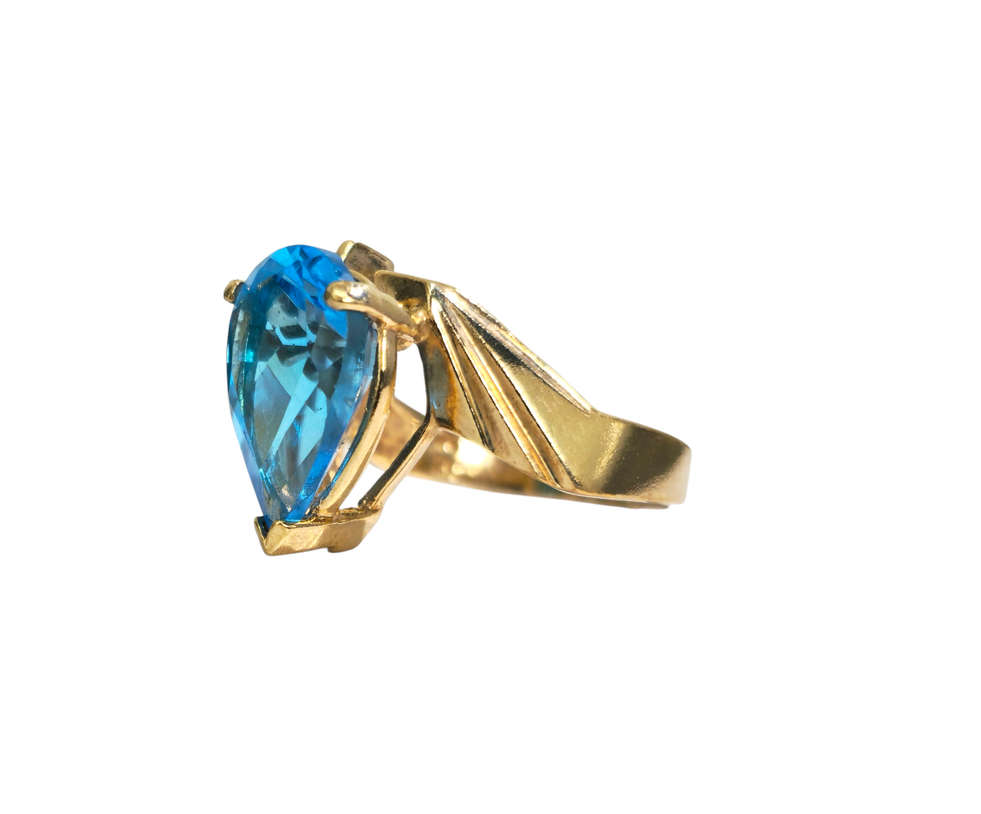 10k gold ring featuring a 5.80 carat topaz center stone surrounded by diamonds, crafted by Prince The Jeweler.