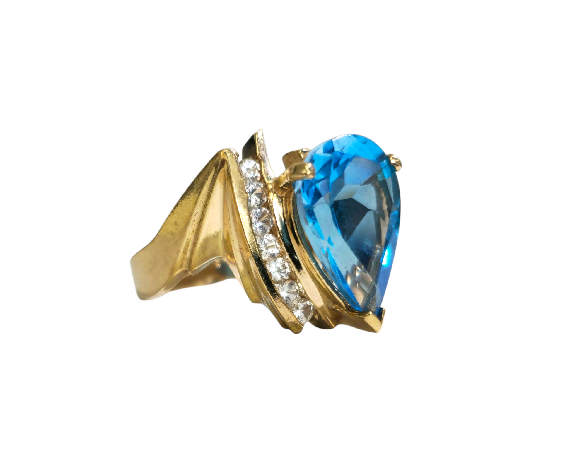Elegant 10k gold ring featuring a 5.80 carat topaz center stone accented with diamonds, crafted by Prince The Jeweler.