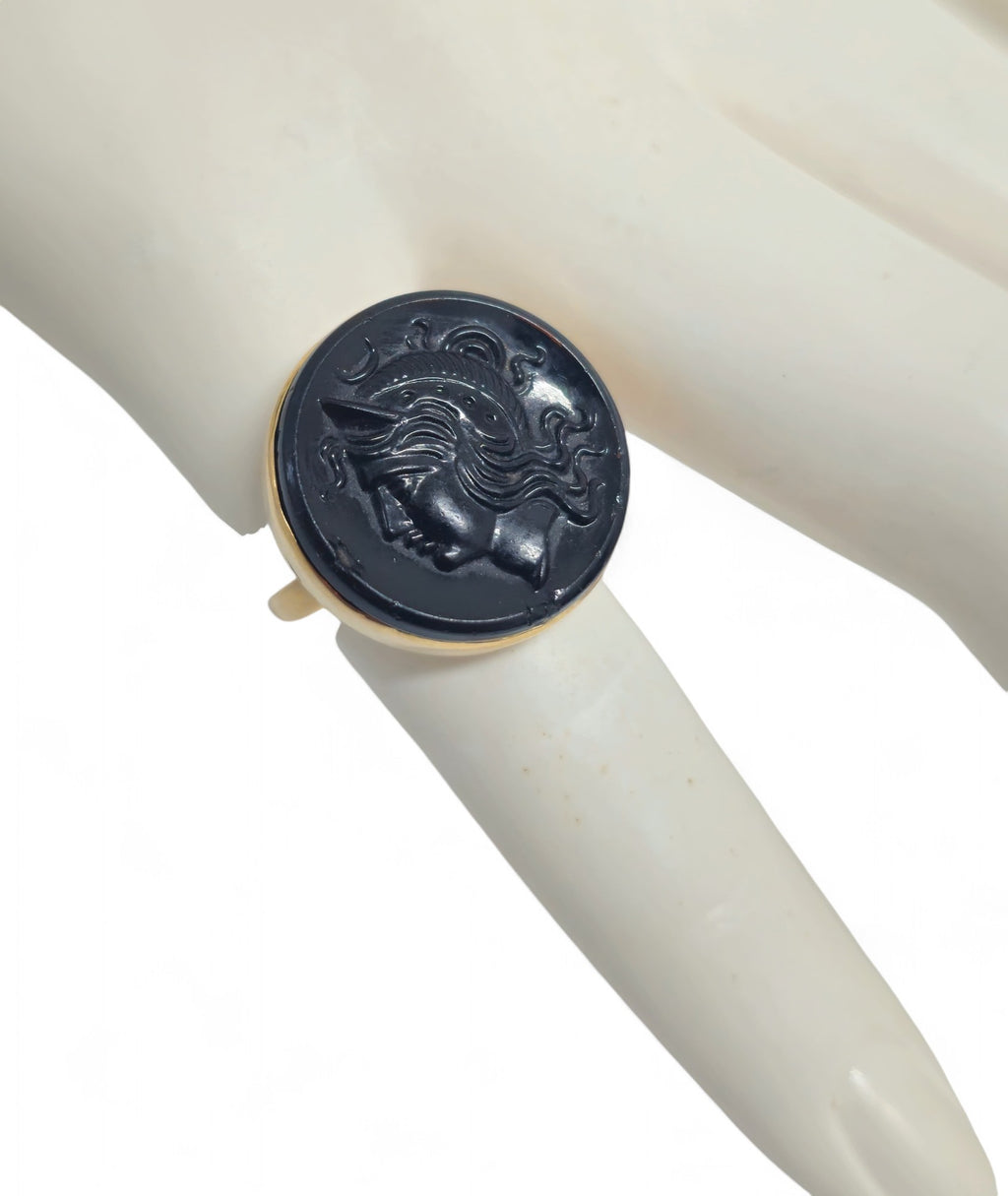 14k yellow gold black agate cameo ring for women, featuring intricate carved design and elegant jewelry craftsmanship.