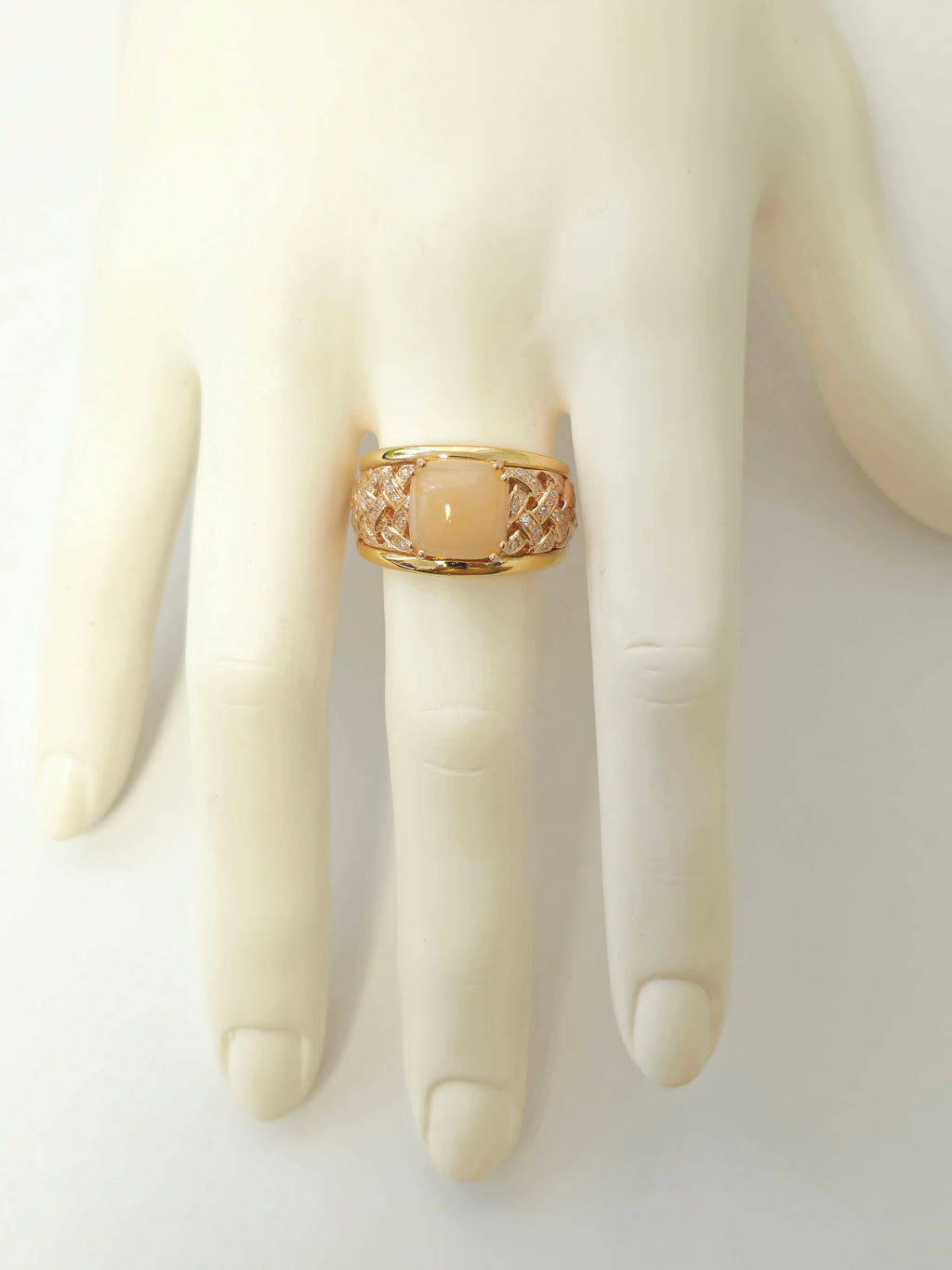 Women's modern pink opal and diamond engagement ring by Prince The Jeweler, featuring a 5.70 carat pink opal centerpiece.