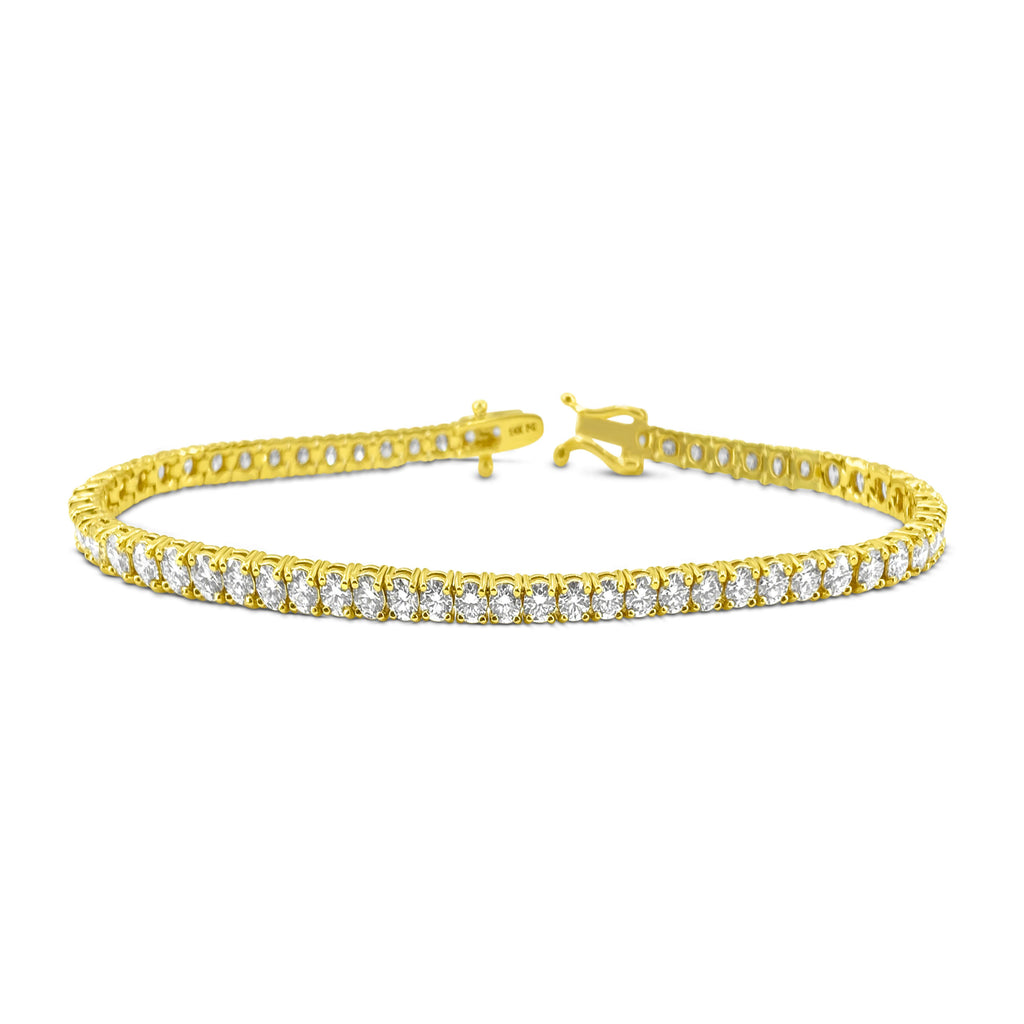 14k gold diamond tennis bracelet featuring 6.25 carats of VVS clarity diamonds, showcasing elegant jewelry craftsmanship.