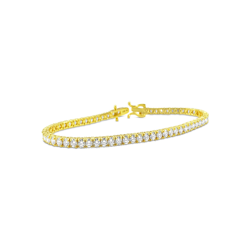 14k gold diamond tennis bracelet featuring 6.25ct VVS diamond stones, elegant jewelry piece from Prince The Jeweler.