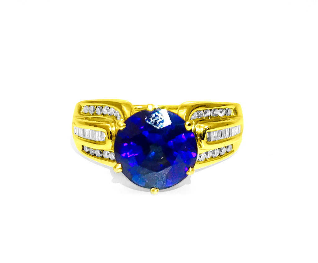 Vintage natural 7.00 carat blue sapphire diamond ring featuring a classic design, set in an elegant band with intricate detailing.