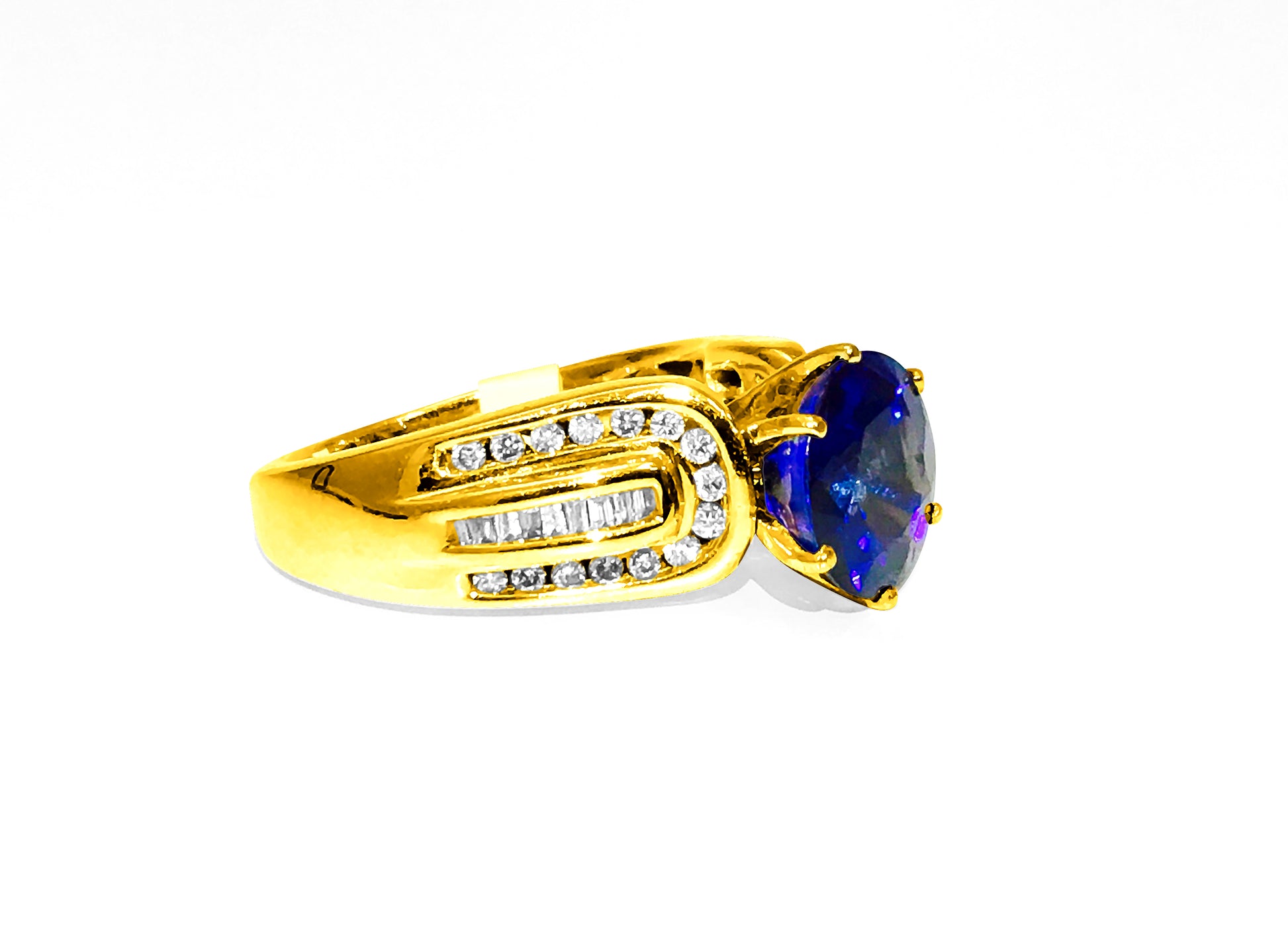 Vintage Natural 7.00 Carat Blue Sapphire Diamond Ring featuring a large blue sapphire center stone and diamond accents, crafted by Prince The Jeweler.