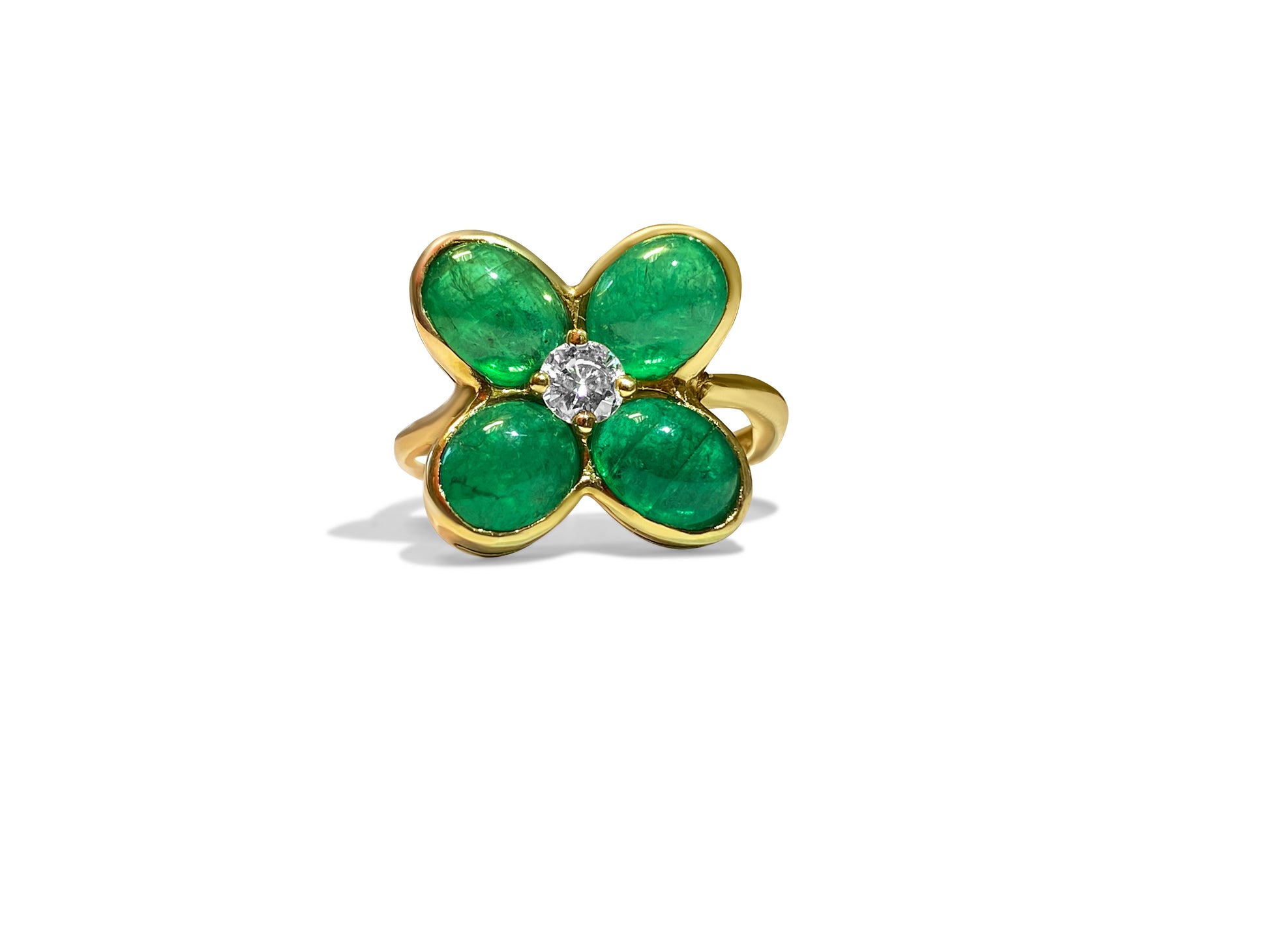 18K gold emerald and diamond ring featuring an 8.50 carat emerald center stone with surrounding diamonds, crafted by Prince The Jeweler.