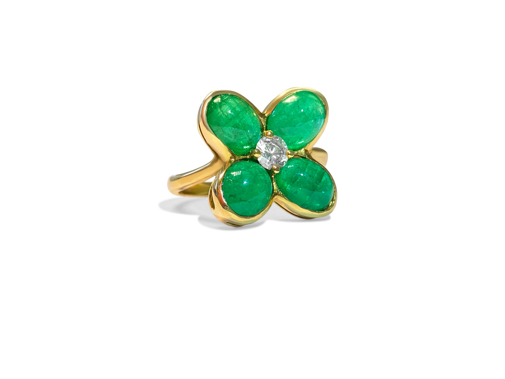 18K gold ring featuring an 8.50 ct emerald and diamond accents, crafted by Prince The Jeweler.