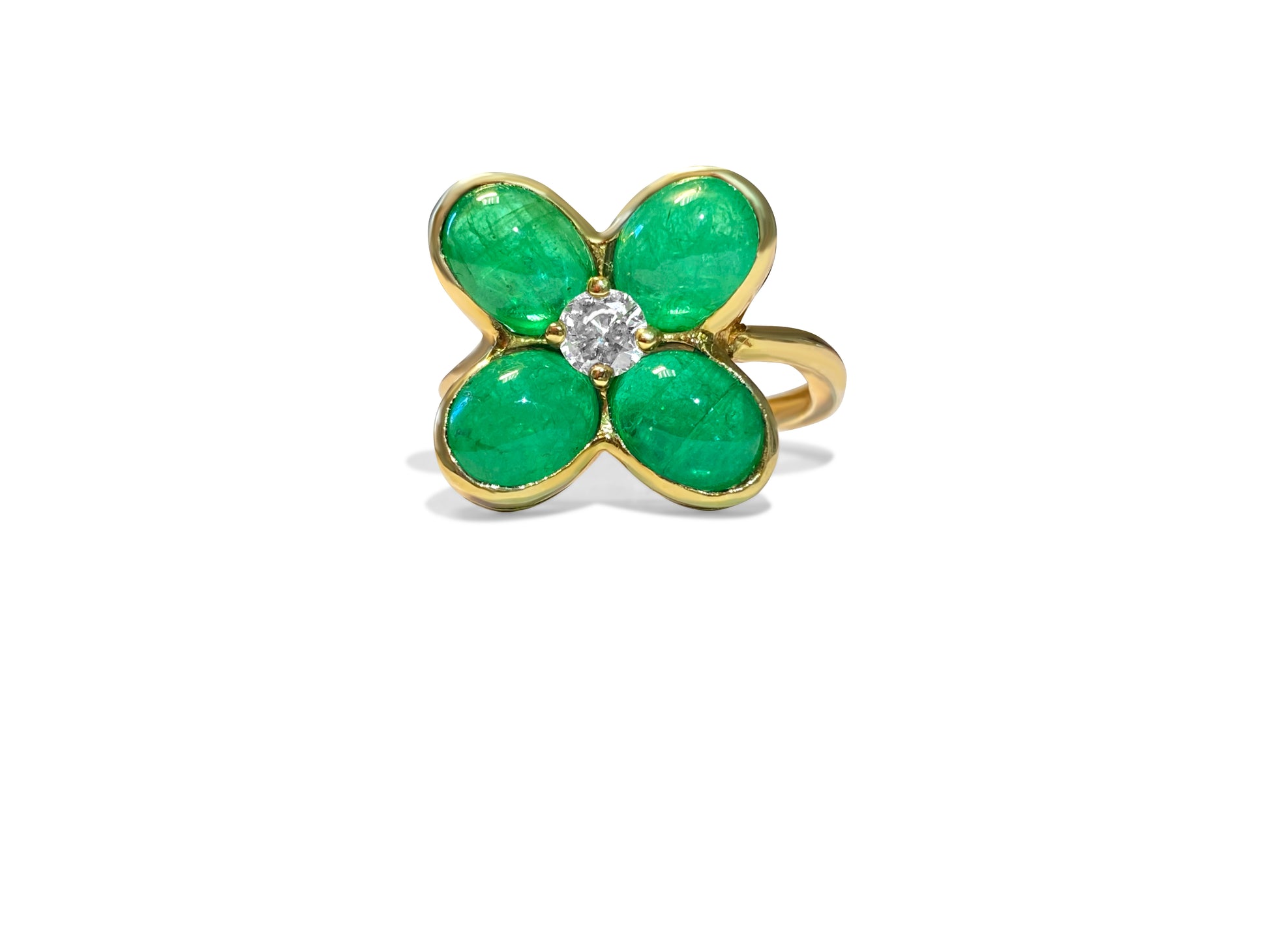 18K gold ring featuring an 8.50 carat emerald surrounded by diamonds, crafted by Prince The Jeweler.