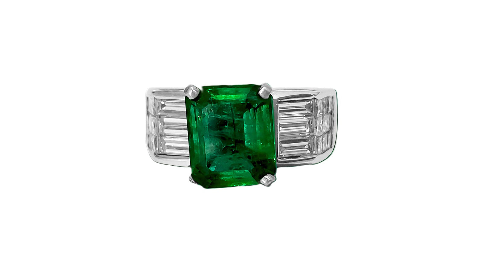 Vintage 2.50ct natural emerald and diamond ring featuring intricate metalwork, crafted by Prince The Jeweler.