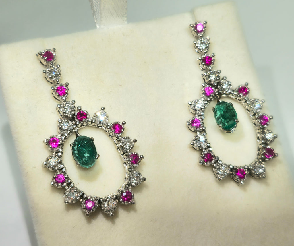 Elegant emerald, diamond, and ruby dangle earrings by Prince The Jeweler featuring intricate gemstone detailing.