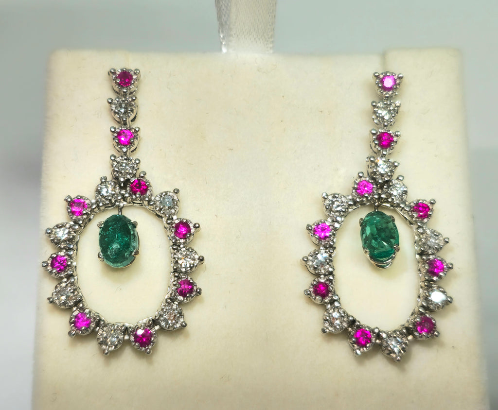 Emerald, diamond, and ruby dangle earrings by Prince The Jeweler featuring intricate gemstone designs and elegant craftsmanship.