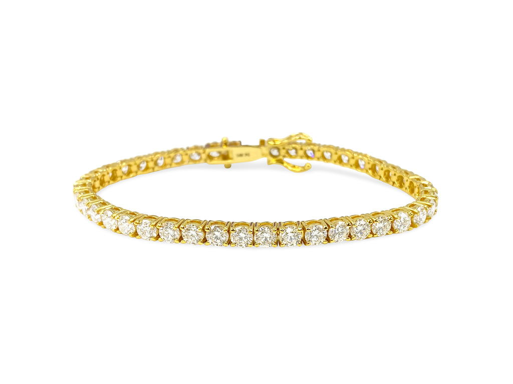 VVS diamond tennis bracelet in 14k gold featuring 10.50 carats of sparkling diamonds by Prince The Jeweler