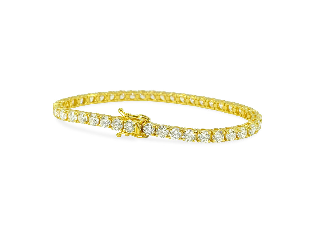VVS diamond tennis bracelet in 14k gold with 10.50 carats, featuring sparkling diamonds set in a elegant jewelry design.