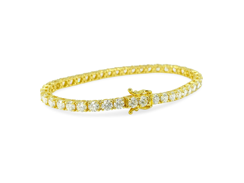 VVS diamond tennis bracelet weighing 10.50 carats in 14k gold with sparkling diamonds, elegant jewelry piece.
